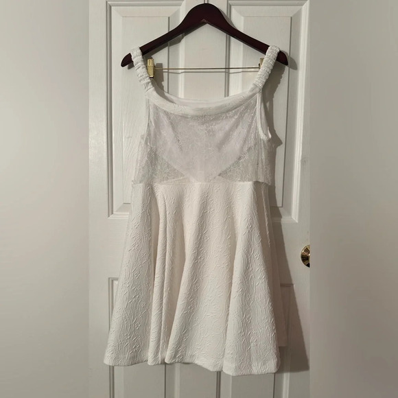 NWOT Free People ALLURING Brooklyn Mini Dress White L Lace Sheer Twirly Pockets - Picture 10 of 16